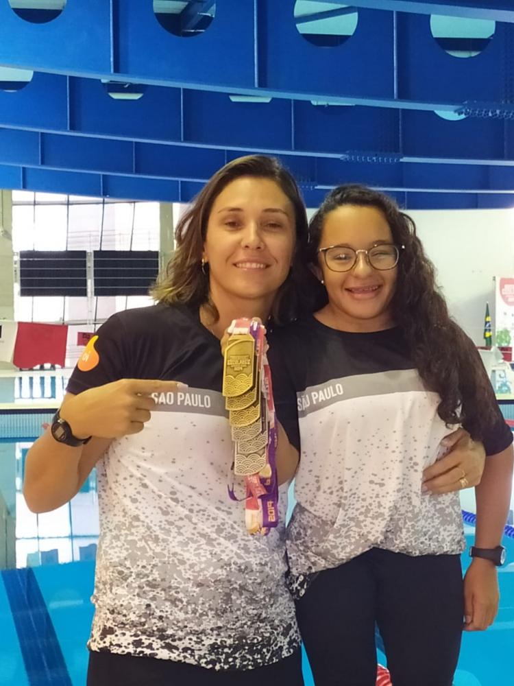 Cedida - Micheline e Dayara, treinadora e aluno compartilham de várias experiências juntas