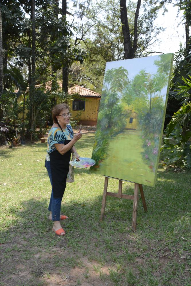 Elisabete Santos - Embora a paisagem seja sua temática predominante, a artista pinta flores e frutas com o mesmo fervor